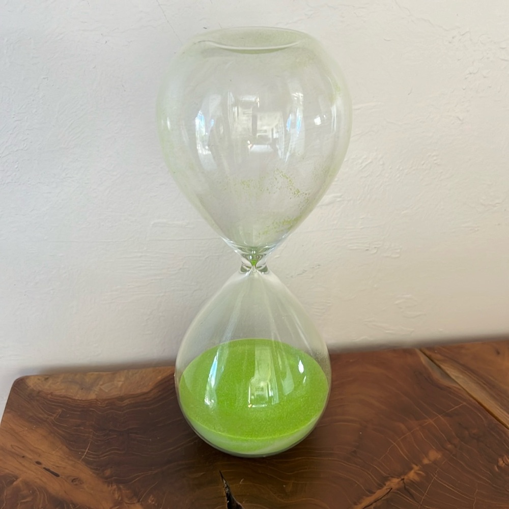 Decorative hour glass with green sand 8” tall